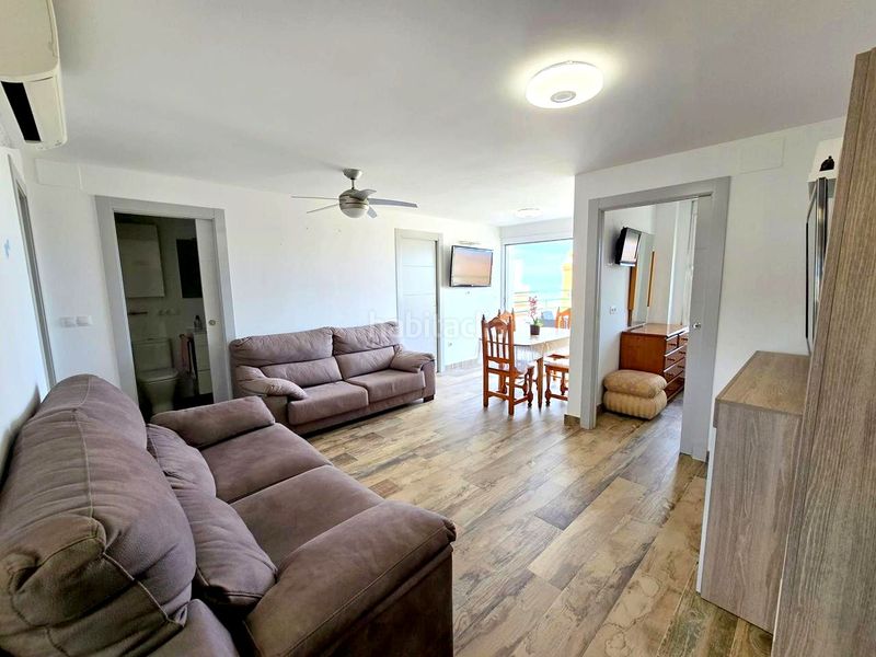 Foto ce95f73b-d1e4-47b5-84cb-eea9a9a16509. Apartamento en calle de la devesa 7 atico playa reformado 3 habitaciones, 2 baños, salon , gran terraza, garaje, jardin, piscina y tenis en Gandia