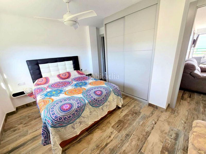 Foto f38e7f3d-abf3-4aa0-817c-fb76809693b1. Apartamento en calle de la devesa 7 atico playa reformado 3 habitaciones, 2 baños, salon , gran terraza, garaje, jardin, piscina y tenis en Gandia