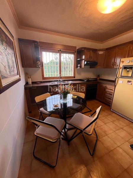 Foto 0fef4f2f-27a0-4630-aa23-21b3338566fb. Casa amb aparcament a Urbanizaciones Benidorm