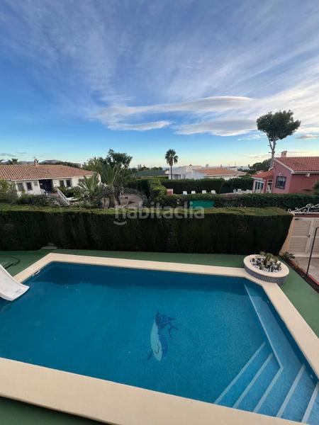 Foto 1da622f2-a1a4-4e64-ac9c-b6e14d7b357a. Casa amb aparcament a Urbanizaciones Benidorm