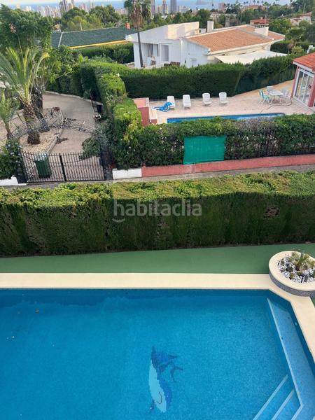 Foto bc37f12f-a89b-47ba-b9bd-8adfa7c056f5. Casa amb aparcament a Urbanizaciones Benidorm