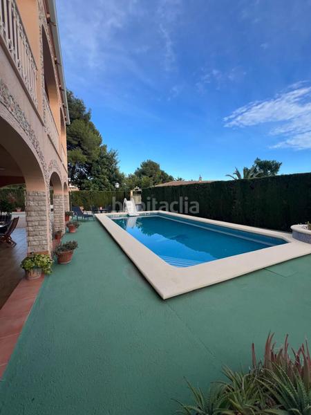 Foto f47c84a0-6a18-4f38-8627-47cee595c7c6. Casa amb aparcament a Urbanizaciones Benidorm