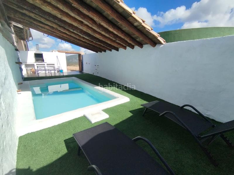 Foto df84409e-af7d-41f2-b569-381480fed8ee. Casa con camino riscaldamento parcheggio piscina in Peñarroya de Tastavins