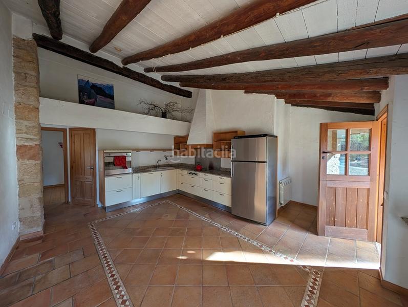 Foto b109b954-ac3e-4eb8-8737-e17ba8f31812. Xalet amb xemeneia calefacció a Beceite