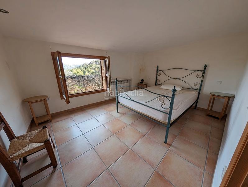 Foto b5565b32-a787-4a0b-8607-ab7c697853cf. Xalet amb xemeneia calefacció a Beceite