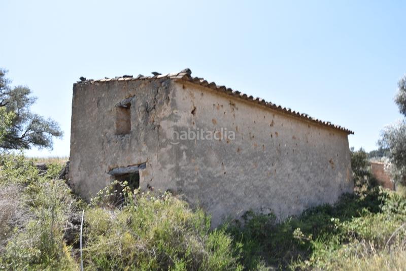 Foto a3242241-4c02-4c88-bc7a-e4795d1fe432. Finca rústica  con masía en Lledó
