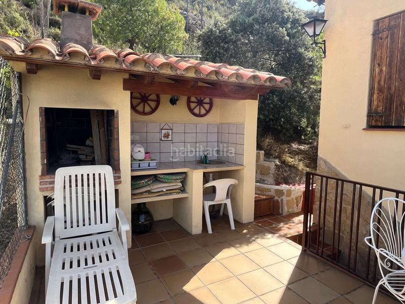 Foto d41cc668-c42f-4182-a95e-40f43134c4b8. House with fireplace heating parking in Beceite