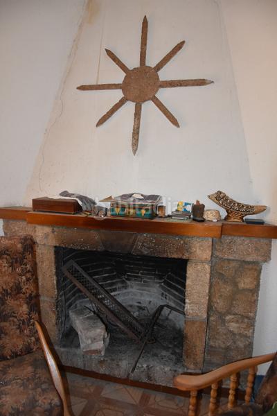 Foto d5c8fdb8-6a60-4092-af2f-00f1e66cfc3e. Casa amb xemeneia a Beceite