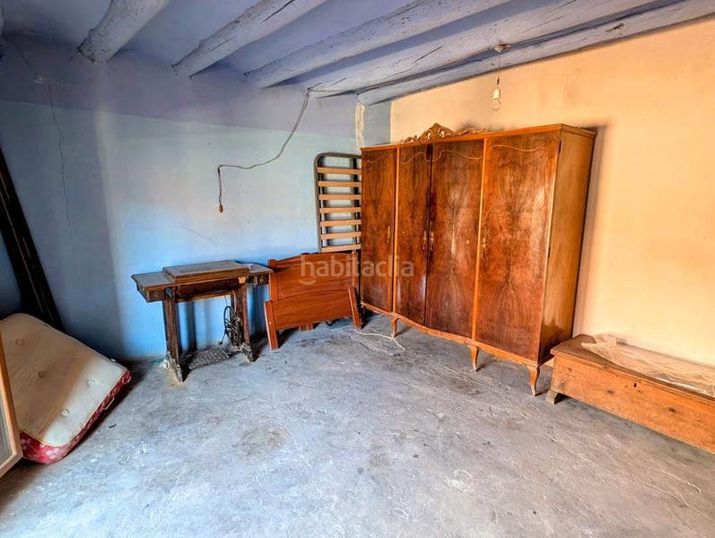 Foto d8fbda8a-56e1-41cb-9111-7cd76a57dbeb. Casa con camino parcheggio in Ráfales