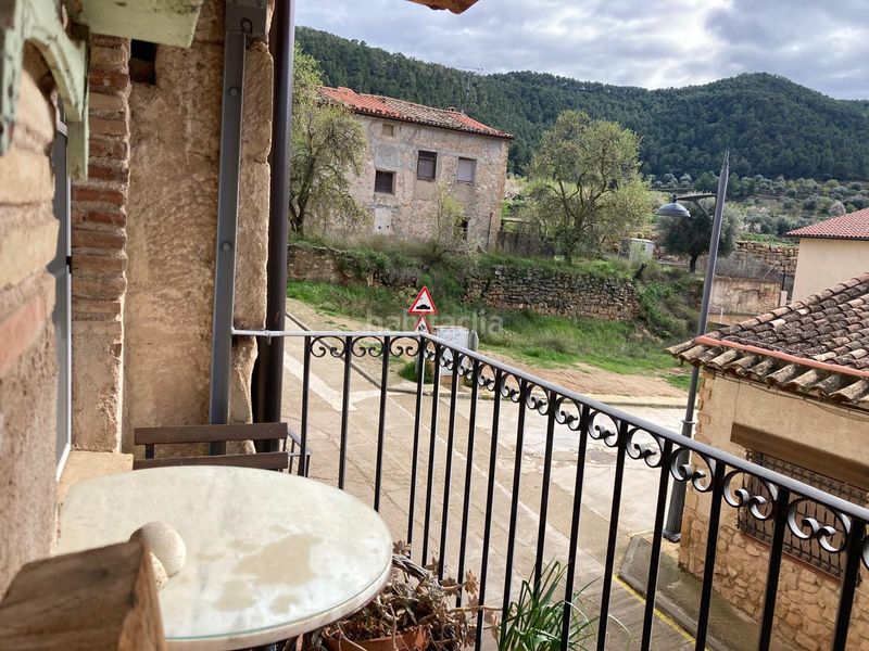 Foto f9b9158d-7267-4707-bd55-eb88e2ff0217. Casa amb xemeneia a Portellada (La)