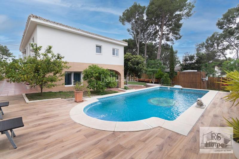 Foto 0c297bba-4541-4a7b-99f3-025758d8992c. Xalet amb calefacció aparcament piscina a Entrepinos Eliana (l´)