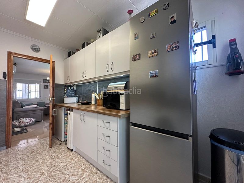 Foto ddff1ca7-2a0f-40f1-8d3c-70a61f0cddd7. Casa amb aparcament a San Fulgencio
