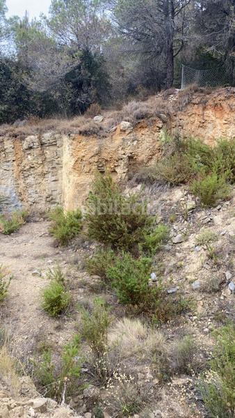 Foto bb40e574-2ae5-4e54-8ac2-1ad71a72402e. Terreno residencial parcela edificable con proyecto y excavaciones ya realizados en Sant Feliu de Codines