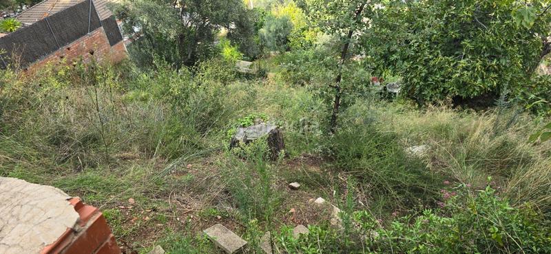Foto 6bce3bd0-e0ad-4d46-bb05-b21b0dd2c03b. Terreno residencial oportunidad. solar edificable de 484 m2 para edificar, con pendiente descendiente en Sant Feliu de Codines