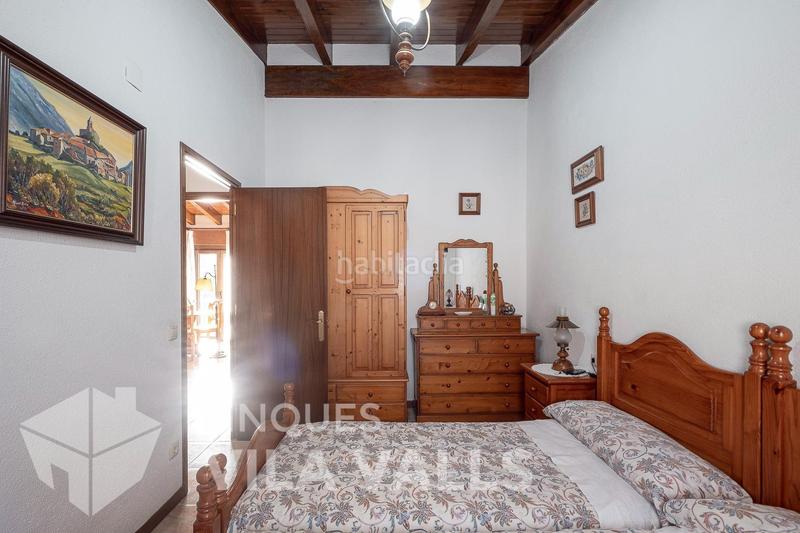 Foto f633d51a-0488-48f1-9886-9593383e4370. Casa  de piedra en el centro con jardín en Castellcir