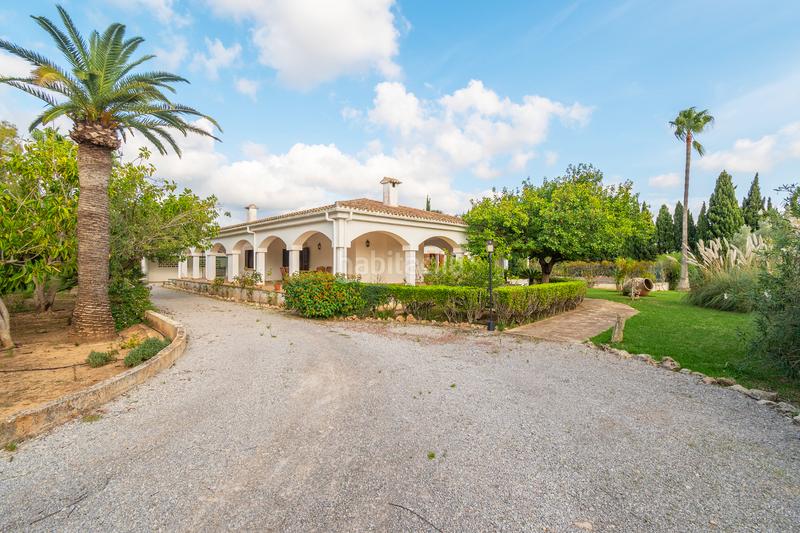 Foto db58945a-1cb9-41fd-a8bc-7aa050a3990a. Chalet avec cheminée chauffage parking piscine dans Alcúdia