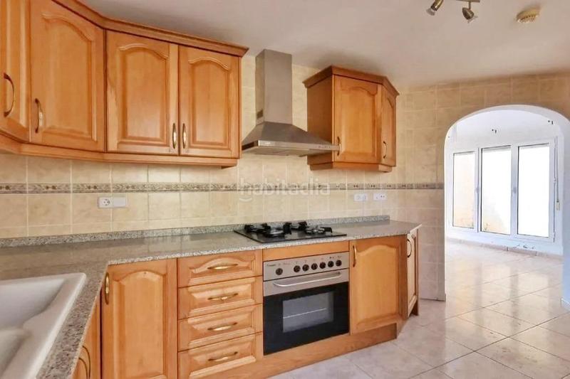 Foto cfd115d0-1c19-498c-a580-b93db6c32848. Casa adossada amb aparcament piscina a Gata de Gorgos