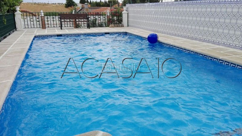 Foto f4841ac5-8d61-44b1-8f1f-14d5cea7b606. Casa amb aparcament a Yuncos