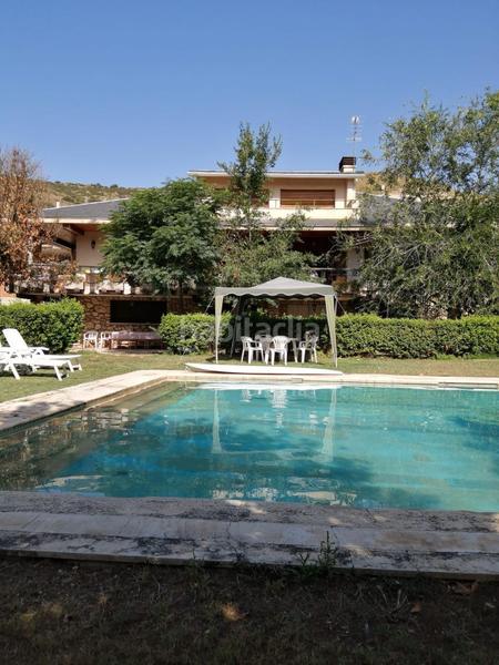Foto b7b012bb-b3c7-4bbd-8b4a-868440f5d69c. Xalet amb calefacció aparcament piscina a Tielmes