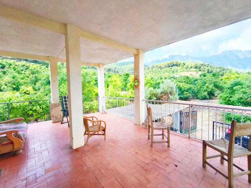 Foto 1295dd27-4890-44f7-82a4-ba0a01b9a357. Casa adossada amb aparcament a Llaurí