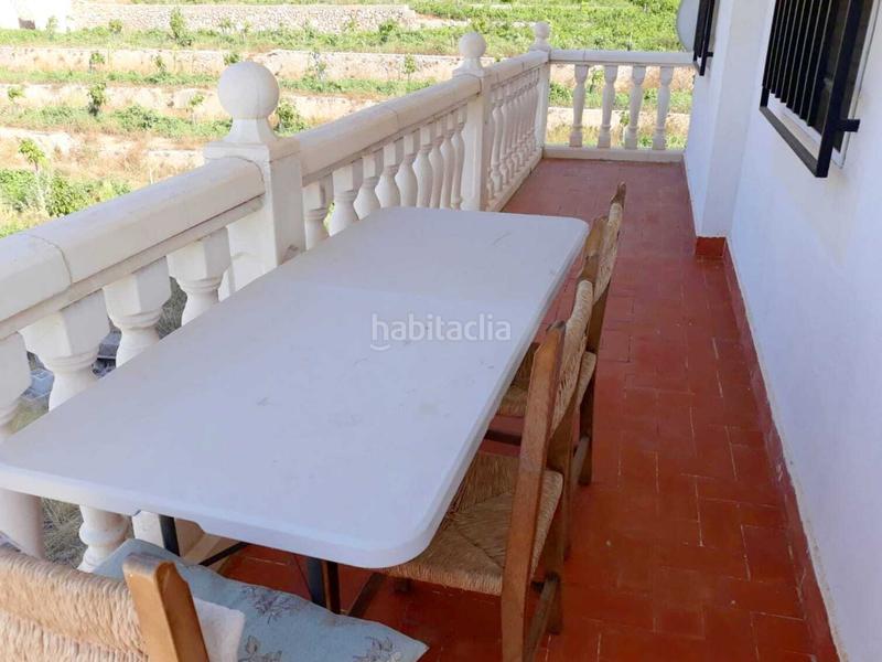 Foto 2915b005-651c-4fdd-a9c6-f3596265cb5c. Casa adossada amb aparcament a Llaurí