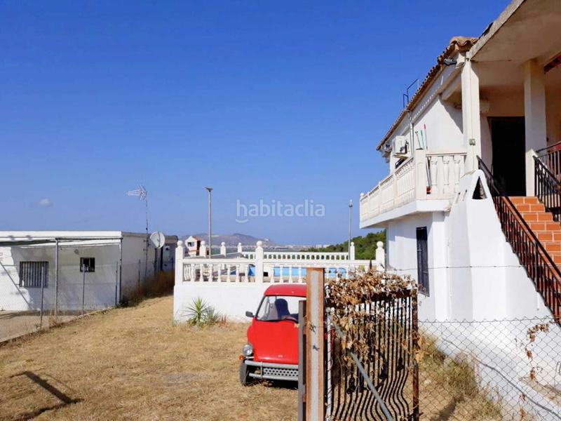 Foto d8744e16-6ebb-479f-a24e-022f5cf27eef. Casa adossada amb aparcament a Llaurí