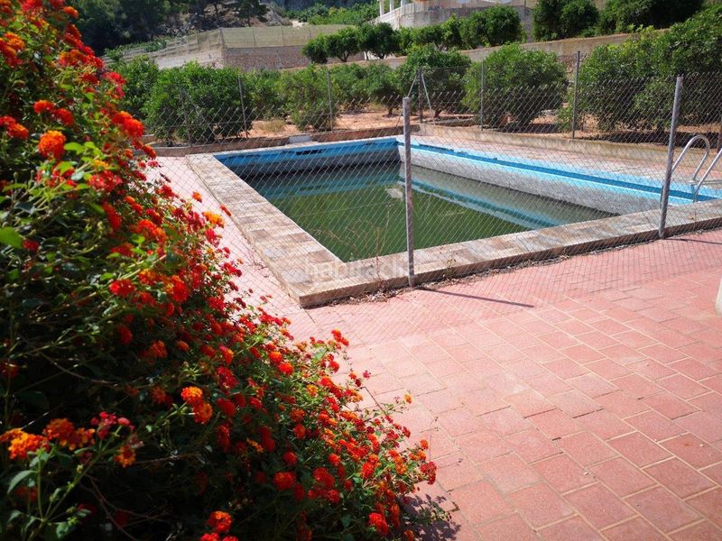 Foto 98051db4-4a10-41ce-bad5-433705232036. Masia amb piscina a Tavernes de la Valldigna