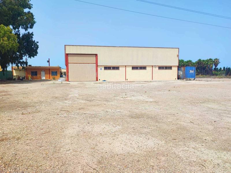 Foto 1983cb06-c922-4827-acf3-497007056c1d. Nave industrial  situada en el polígono , bien comunicada y con buen acceso desde la carretera principal, con 2 puertas de en Sueca