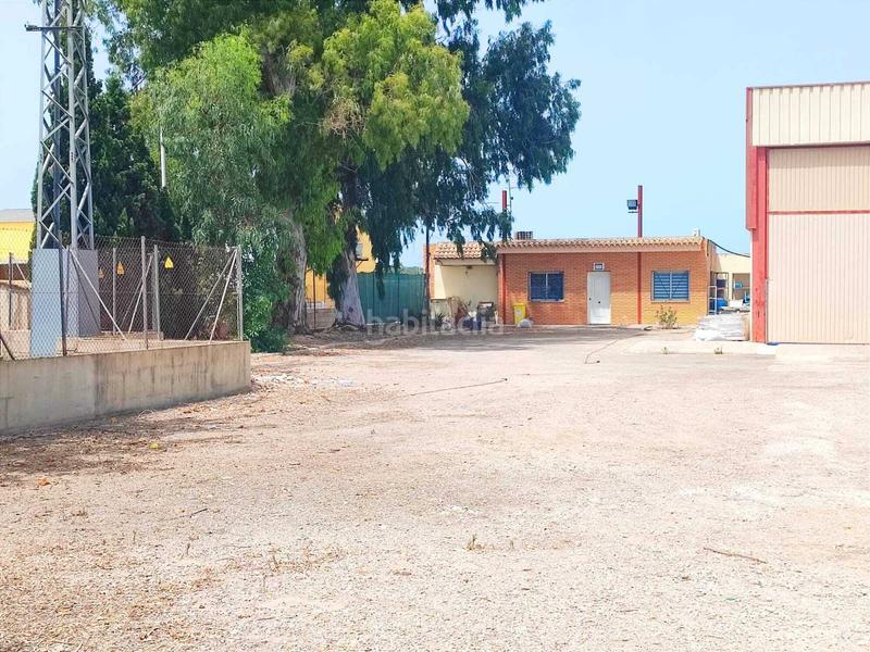 Foto 3cc76a75-bbb9-4c62-ab38-93c8c2b751ce. Nave industrial  situada en el polígono , bien comunicada y con buen acceso desde la carretera principal, con 2 puertas de en Sueca