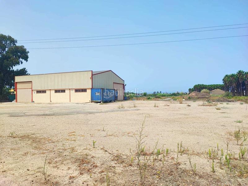 Foto 76438ee1-6020-4ffe-b591-e95a4063c20b. Nave industrial  situada en el polígono , bien comunicada y con buen acceso desde la carretera principal, con 2 puertas de en Sueca