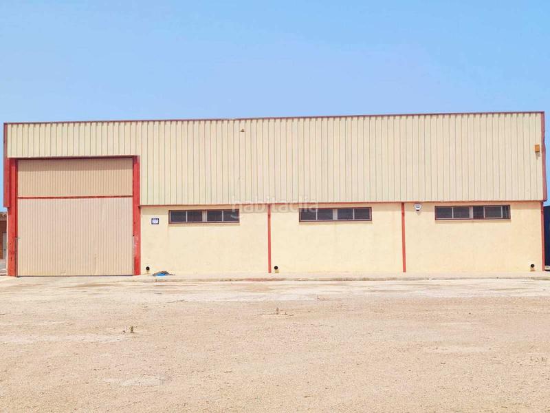 Foto 7b7e8089-36cf-4a95-aa66-f4df2a68733a. Nave industrial  situada en el polígono , bien comunicada y con buen acceso desde la carretera principal, con 2 puertas de en Sueca