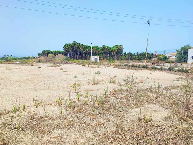 Foto c2d7b8b5-cab5-443a-8448-506c54316f7c. Nave industrial  situada en el polígono , bien comunicada y con buen acceso desde la carretera principal, con 2 puertas de en Sueca