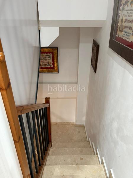 Foto 77aad9f6-30b0-474f-aa45-888a4ea325c5. Casa adossada amb aparcament piscina a Bulevar del Xúquer Cullera