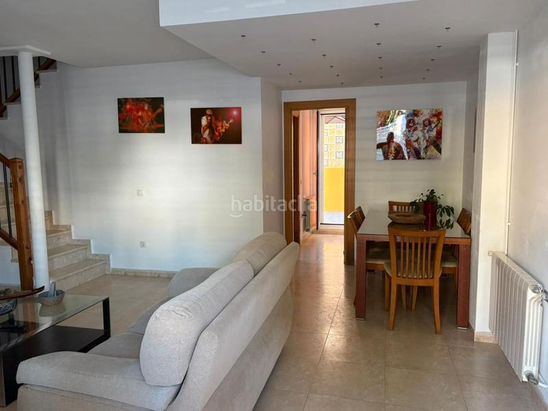 Foto 9b99c2e2-3186-4544-8047-9bbde23a6611. Casa adossada amb aparcament piscina a Bulevar del Xúquer Cullera