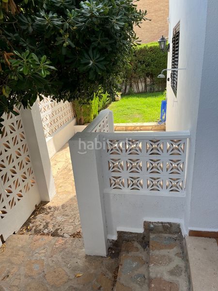 Foto c6048456-2db4-44a5-808a-57a0f8298084. Casa adossada amb aparcament a Mareny Blau Sueca