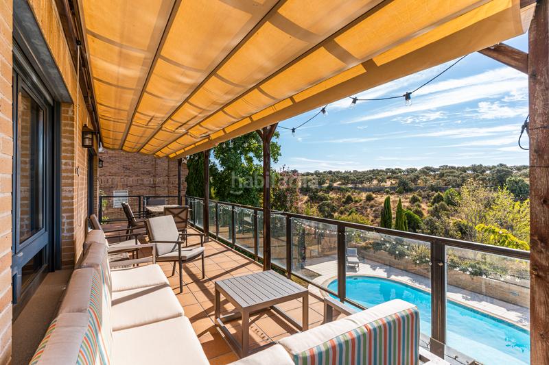 Foto 4e993b4e-0f3d-409f-8273-b08389e8876c. Chalet avec chauffage parking piscine dans El Monte Torrelodones