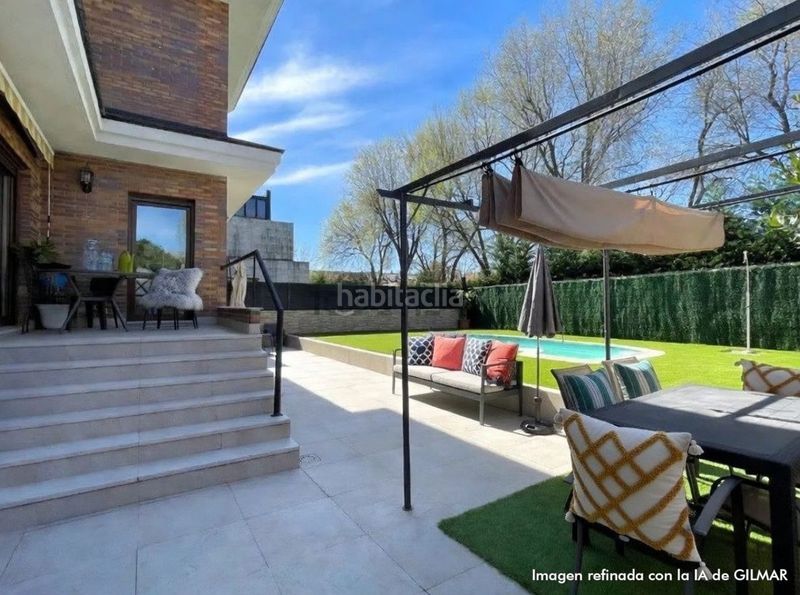 Foto 1e2b5db2-c89e-4778-9f62-fd85255341fd. Casa aparellada amb calefacció aparcament piscina a Rozas de Madrid (Las)