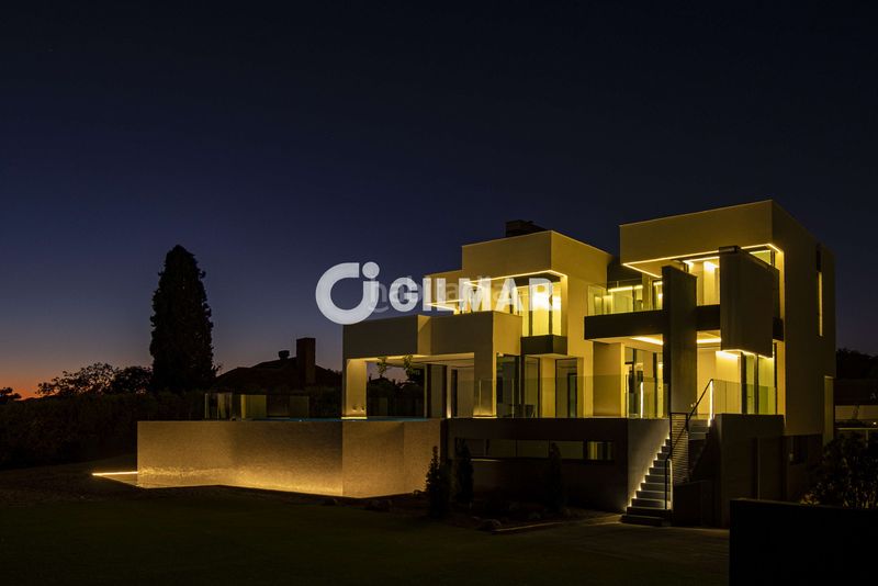 Foto 5b0c93cd-3125-44c6-8cbe-2e9dc969721e. Chalet avec chauffage parking piscine dans Club de Golf Rozas de Madrid (Las)