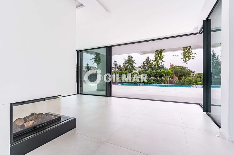 Foto b94605e9-f6e5-46ce-b539-4403455abf24. Chalet avec chauffage parking piscine dans Club de Golf Rozas de Madrid (Las)