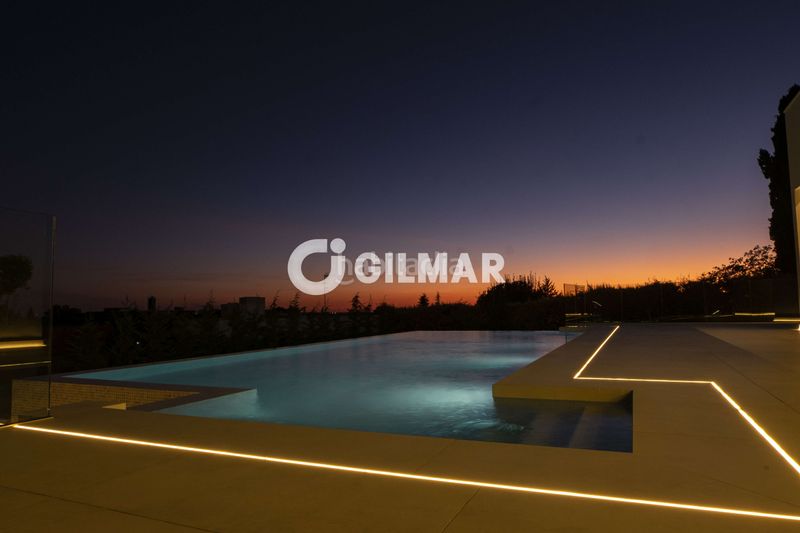 Foto e8446a6d-fade-4c65-9eb1-d8b3f9cda78e. Chalet avec chauffage parking piscine dans Club de Golf Rozas de Madrid (Las)