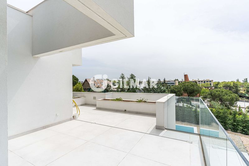 Foto f2cdaa12-6519-4489-88dd-5a4a5ea929c9. Chalet avec chauffage parking piscine dans Club de Golf Rozas de Madrid (Las)