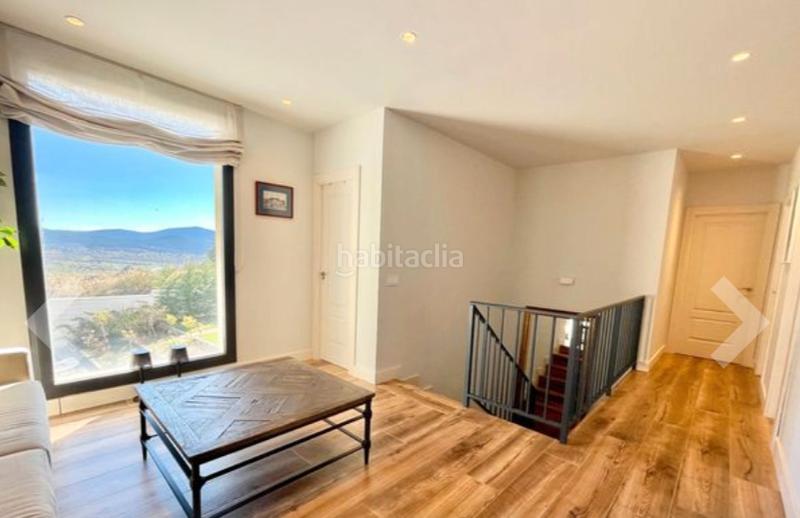 Foto f570ef18-e0eb-409c-9bfb-4aed77907142. Chalet with fireplace heating parking pool in Los Ángeles de San Rafael Espinar (El)