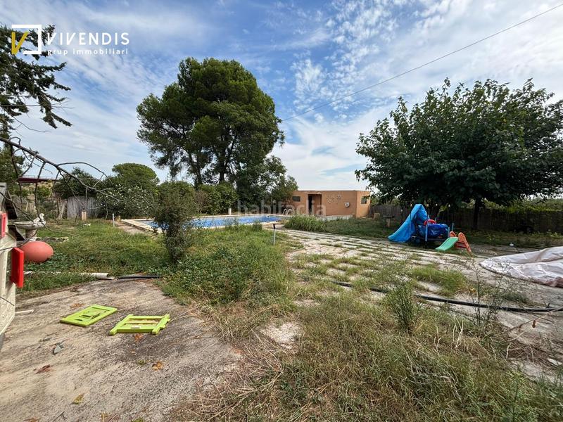 Foto 5dc8e0de-b890-4c48-ab6e-8005af549970. Casa amb calefacció aparcament piscina a Partides Rurals Lleida