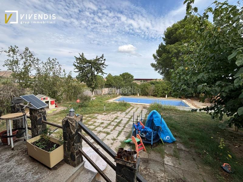 Foto 6a2c478e-ffe0-4d34-bb52-bb354be8aea9. Casa amb calefacció aparcament piscina a Partides Rurals Lleida