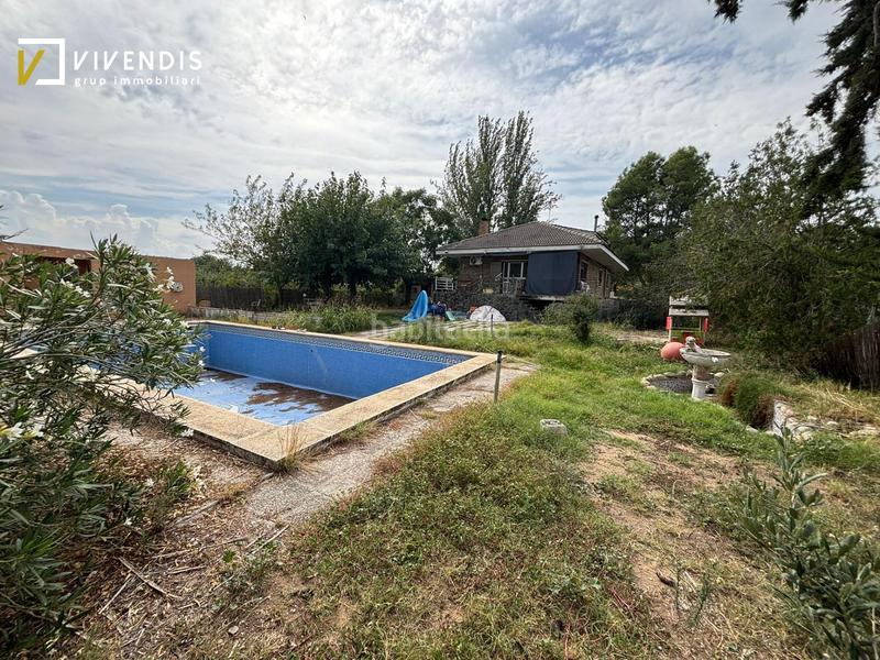 Foto 6da167f2-8bce-4591-a012-0f68dbec0676. Casa amb calefacció aparcament piscina a Partides Rurals Lleida