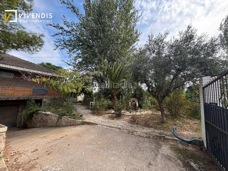 Foto ac7d35aa-e5f0-458d-abac-251925ffa356. Casa amb calefacció aparcament piscina a Partides Rurals Lleida