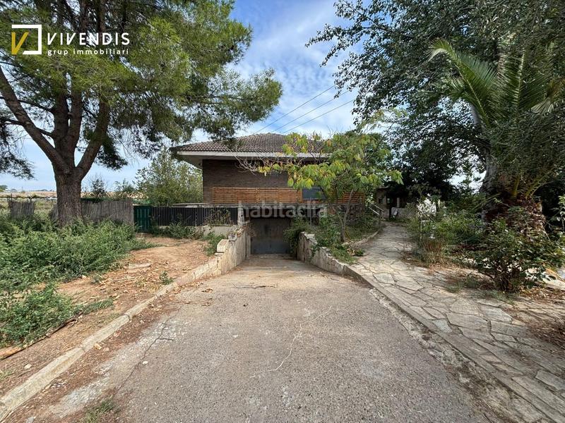 Foto cfa03c12-4bd2-43d7-86fd-ec837273fddd. Casa amb calefacció aparcament piscina a Partides Rurals Lleida