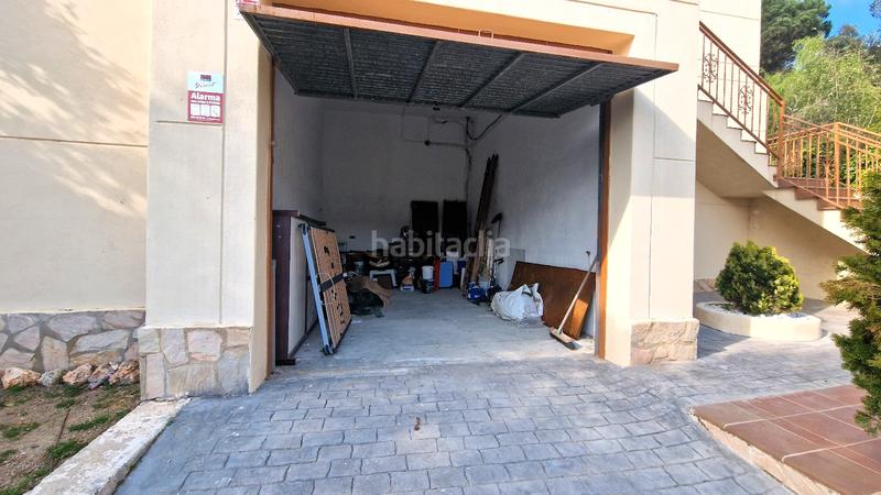 Foto ad9c4d2f-d8e7-44c3-813f-2b4edf163cbd. Casa amb xemeneia aparcament a Aiguaviva Parc Vidreres