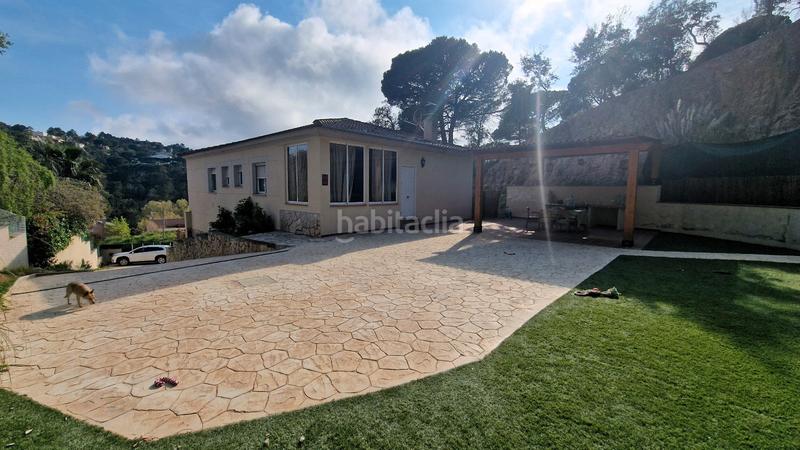 Foto bfb170b1-99e7-4d79-ad92-6fb6a88d3ff9. Casa amb xemeneia aparcament a Aiguaviva Parc Vidreres