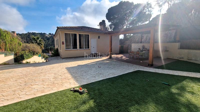 Foto eeeb40fa-09a9-40d1-8c63-597f791a7b65. Casa amb xemeneia aparcament a Aiguaviva Parc Vidreres